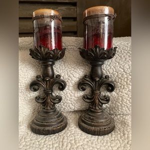 2 candle holders and 2 candles